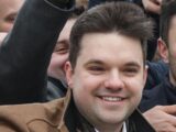 Kontrowersje wokół Dawida Kacprzyka: kulisy zatrudnienia i finansowe korzyści